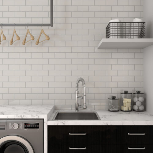 A bathroom or washroom featuring dal tile subway tile