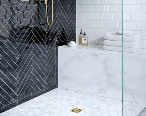 A luxury bench in a shower that can be fabricated and installed by Rumford Stone